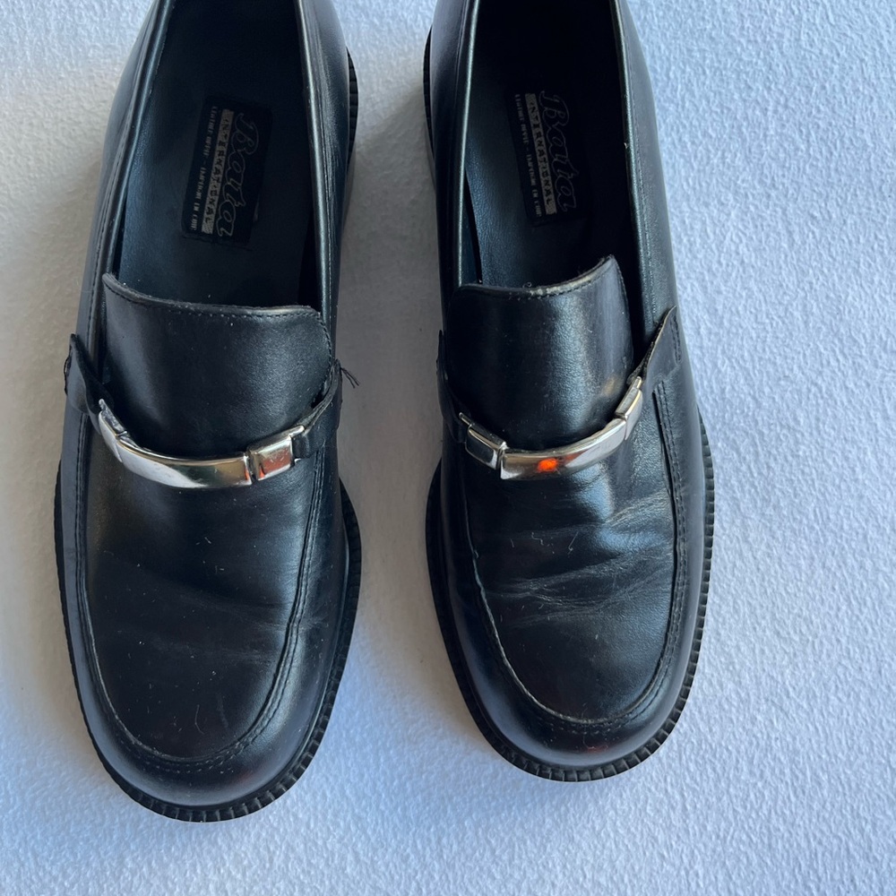 Elegant Black Leather Loafers with Silver Detail